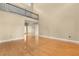 Expansive living room featuring hardwood floors and natural light at 6033 Mountain Lake Dr, Lakeland, FL 33813