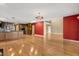 Open-concept living space featuring hardwood floors, recessed lighting, and modern finishes at 6033 Mountain Lake Dr, Lakeland, FL 33813