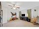 Cozy bedroom featuring neutral tones, ceiling fan, and ample space for relaxing at 615 N Church Ave, Fort Meade, FL 33841
