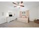 Bright bedroom with soft tones, ceiling fan, and a cozy layout for restful nights at 615 N Church Ave, Fort Meade, FL 33841
