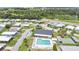 Capture the community's amenities, featuring a refreshing pool, shuffleboard court, and cozy community center at 6443 Hollyberry Ne Ln, Winter Haven, FL 33881