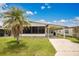 Charming single Gathering home featuring a convenient carport and well maintained lawn at 6443 Hollyberry Ne Ln, Winter Haven, FL 33881