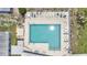 Overhead shot showing the inviting pool area, well-equipped with lounge chairs and a serene atmosphere at 6443 Hollyberry Ne Ln, Winter Haven, FL 33881