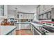 The kitchen offers plenty of counter space, seamless flow into the living area, and modern appliances at 6509 Oak Hammock Ct, Winter Haven, FL 33884