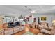 Open-concept living room flows into kitchen, perfect for entertaining at 6509 Oak Hammock Ct, Winter Haven, FL 33884
