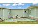 The backyard patio area has a full sun exposure, a storage closet and lots of seating at 6509 Oak Hammock Ct, Winter Haven, FL 33884