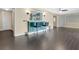 Bonus room with an entertainment bar and two leather bar stools at 686 22Nd Nw St, Winter Haven, FL 33880