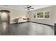 Inviting living room with sleek wood floors, bright natural light, and a comfortable sofa at 686 22Nd Nw St, Winter Haven, FL 33880