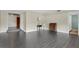 Neutral living room with hard flooring and natural light at 686 22Nd Nw St, Winter Haven, FL 33880