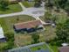 Bird's eye view of home showing the backyard and surrounding greenery at 7150 Orange Way, Lakeland, FL 33810
