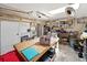 Garage interior features ample workspace, storage shelves, and natural light from a skylight at 7150 Orange Way, Lakeland, FL 33810