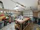 Spacious garage interior with plenty of storage and a workbench area at 7150 Orange Way, Lakeland, FL 33810