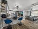 Open floor plan featuring the kitchen, dining area, and living room at 7150 Orange Way, Lakeland, FL 33810