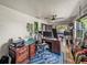 Bright office with a computer setup and views of the screened outdoor area at 7150 Orange Way, Lakeland, FL 33810
