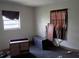 Bedroom featuring natural light from two windows and older furnishings at 745 Drawdy Rd, Babson Park, FL 33827