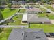 Spacious fenced backyard featuring a covered patio and shed offering plenty of room for outdoor activities at 8219 Rangers Path, Lakeland, FL 33809