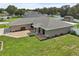 Charming single-story home featuring a two-car garage, neutral paint, meticulous landscaping and inviting curb appeal at 8219 Rangers Path, Lakeland, FL 33809