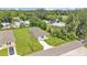Aerial view of the property showcasing the home's layout, driveway, and surrounding neighborhood at 1025 Lakewood Ct, Lakeland, FL 33801