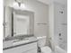 Clean bathroom featuring a granite vanity, toilet, and shower/tub combination at 1025 Lakewood Ct, Lakeland, FL 33801