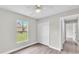 Bedroom with a closet, window, and wood flooring at 1025 Lakewood Ct, Lakeland, FL 33801