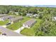 A charming single-story home boasts a well-manicured lawn and a serene neighborhood setting at 1025 Lakewood Ct, Lakeland, FL 33801
