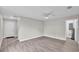 Open living space with modern flooring, and neutral color scheme at 1025 Lakewood Ct, Lakeland, FL 33801