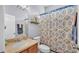 Stylish bathroom featuring modern vanity, patterned shower curtain, and neutral paint scheme at 2472 Tahoe Dr, Lakeland, FL 33805
