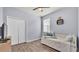 This is a bedroom with wood-look flooring and a closet with double doors at 2472 Tahoe Dr, Lakeland, FL 33805
