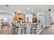 Modern kitchen with breakfast bar, stainless steel appliances, and ample counter space at 2472 Tahoe Dr, Lakeland, FL 33805