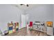 A home office featuring hard wood floors, neutral paint scheme, and lots of natural light at 2472 Tahoe Dr, Lakeland, FL 33805