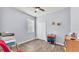 Home office with wood-look flooring, large closet, and rolling rainbow storage cart at 2472 Tahoe Dr, Lakeland, FL 33805
