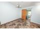 Cozy dining area with tile floors and sliding door leading to the lanai at 2700 Park Ave, Indian Lake Estates, FL 33855
