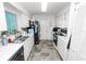 Functional kitchen with ample cabinet space and modern appliances at 2700 Park Ave, Indian Lake Estates, FL 33855