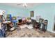 Bright sun room with tile flooring and views of the pool area at 2700 Park Ave, Indian Lake Estates, FL 33855