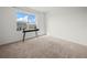 Bright bedroom featuring a window with a view and carpeted floors at 2811 Grandbury Grove, Lakeland, FL 33811