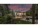 Backyard deck with string lights and a fire pit, perfect for outdoor entertaining at 423 Avenue H Se, Winter Haven, FL 33880