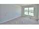 Bedroom featuring neutral walls and carpet at 5298 Tennessee Ridge Ct, Auburndale, FL 33823