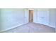 Bright bedroom with carpeting and white trim at 5298 Tennessee Ridge Ct, Auburndale, FL 33823