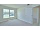 Bedroom with carpet and view of the water at 5298 Tennessee Ridge Ct, Auburndale, FL 33823