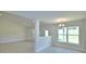 Dining area filled with natural light, light tile flooring and recessed lights at 5298 Tennessee Ridge Ct, Auburndale, FL 33823