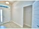 Home entryway with tile flooring, featuring a closet at 5298 Tennessee Ridge Ct, Auburndale, FL 33823