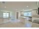 Spacious kitchen area with stainless steel appliances and granite countertops at 5298 Tennessee Ridge Ct, Auburndale, FL 33823
