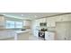 Beautiful kitchen with stainless steel appliances, granite countertops and island at 5298 Tennessee Ridge Ct, Auburndale, FL 33823