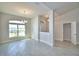 Open floor plan showcases tile floors, neutral paint colors, and plenty of natural light at 5298 Tennessee Ridge Ct, Auburndale, FL 33823
