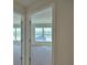 Bright living room showcasing neutral walls and carpet at 5298 Tennessee Ridge Ct, Auburndale, FL 33823