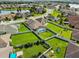 Single-Gathering home with a screened-in pool, fenced backyard, and view of the lake at 5611 Aral Dr, Lakeland, FL 33805