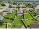 Single-Gathering home with fenced backyard, screened-in pool, well-kept lawn and view of the lake at 5611 Aral Dr, Lakeland, FL 33805