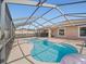 Relaxing pool area with blue water and screened-in lanai at 5611 Aral Dr, Lakeland, FL 33805