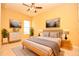 Bedroom featuring a neutral color palette, modern furnishings and natural lighting at 6408 Christina Chase Pl, Lakeland, FL 33813