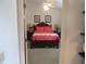 Inviting bedroom featuring carpet flooring, ceiling fan, and a queen sized bed at 7923 Glenridge E Loop, Lakeland, FL 33809
